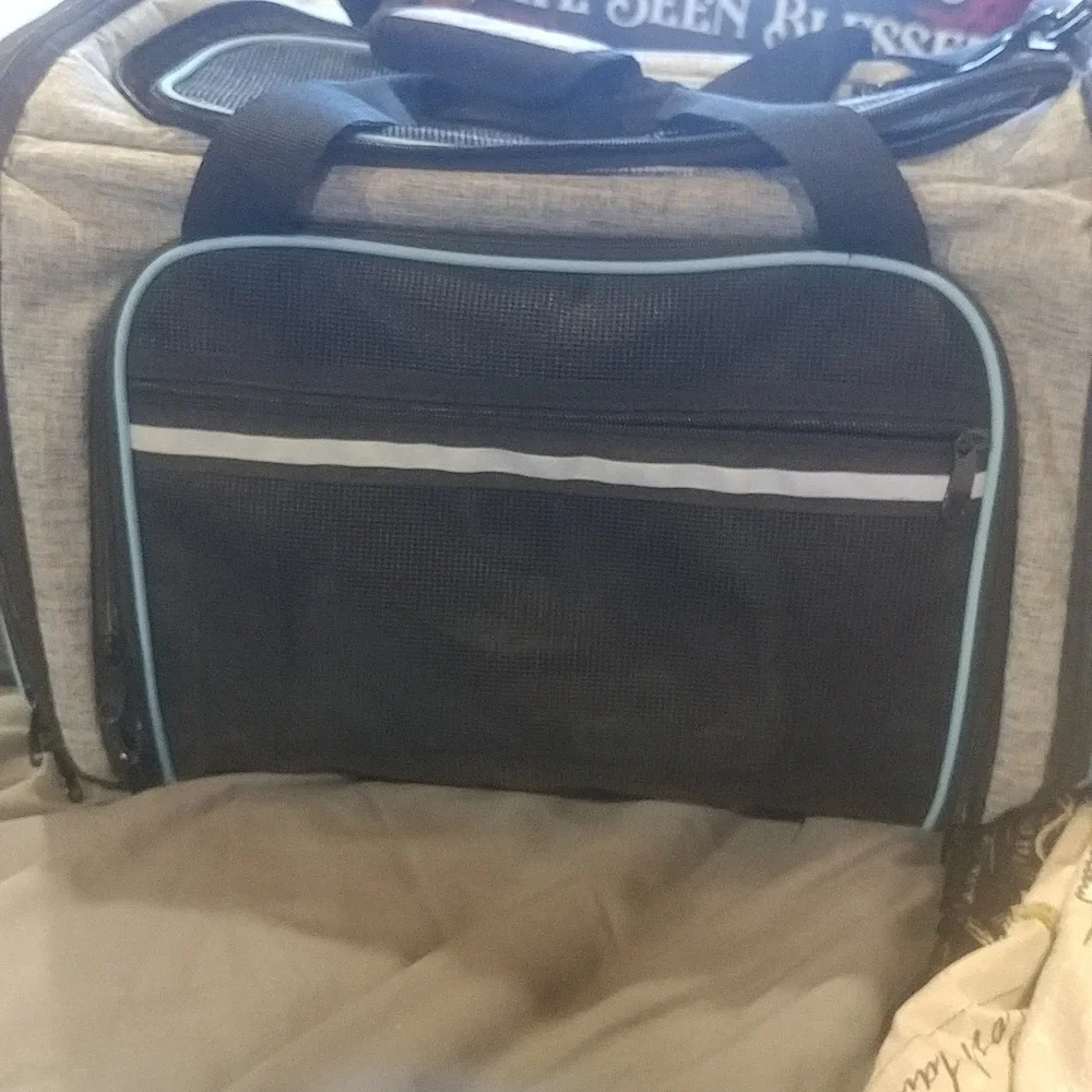 A small dog carrier excellent condition never used